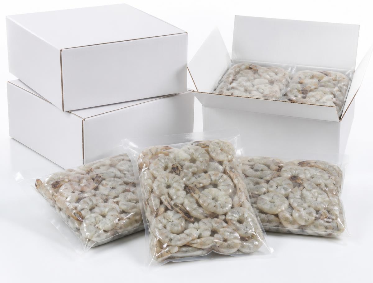 Sealed frozen shrimp packs beside plain white master cartons